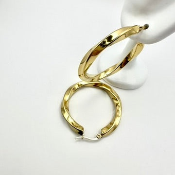 Große Creolen „Golden Spiral“ im Twist-Design