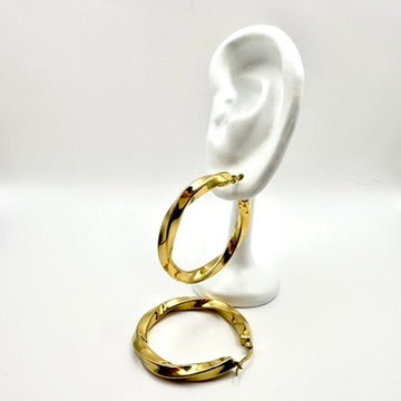 Große Creolen „Golden Spiral“ im Twist-Design