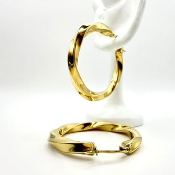 Große Creolen „Golden Spiral“ im Twist-Design